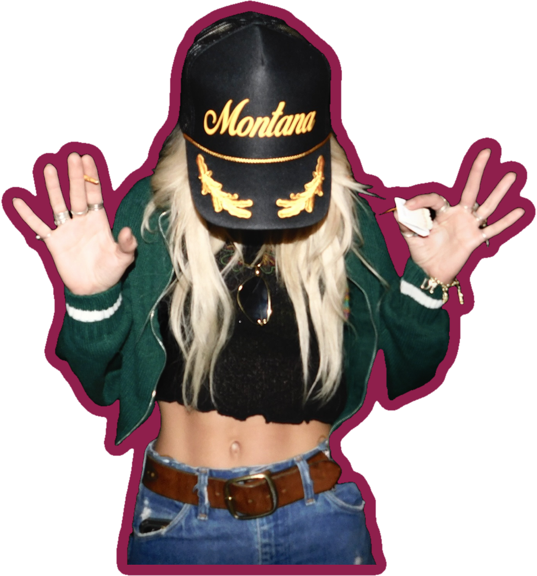 Darla Jane in a green cardigan and black Montana trucker hat, hands raised, with a pink sticker outline